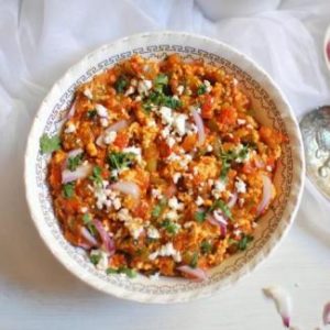Close up view of Easy Paneer Bhurji Recipe, garnished with finely chopped coriander leaves and ready to serve