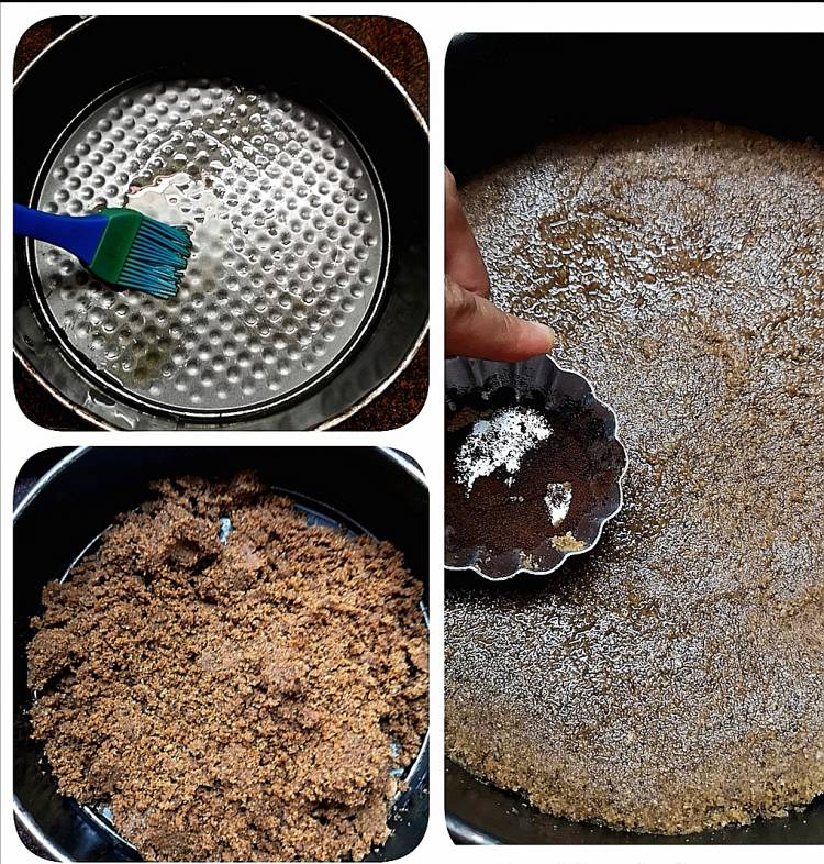 Greasing chocolate tart tin with butter and add crushed biscuits for preparing chocolate tart base