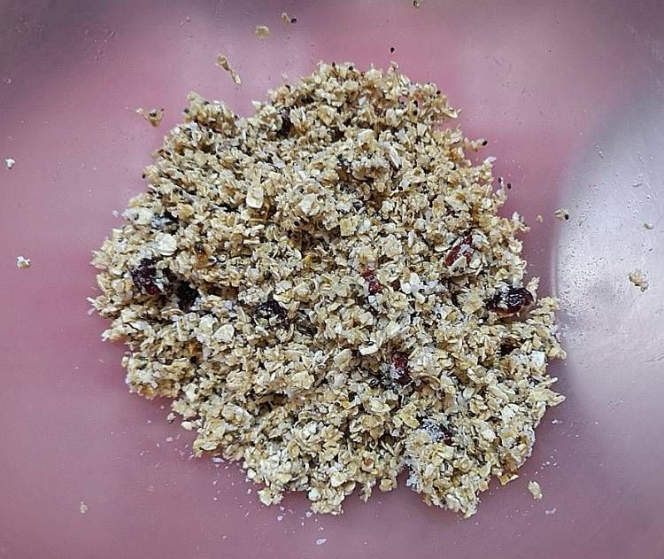 mixing all the ingrdients for no cook, no bake cranberry oats bites recipe 