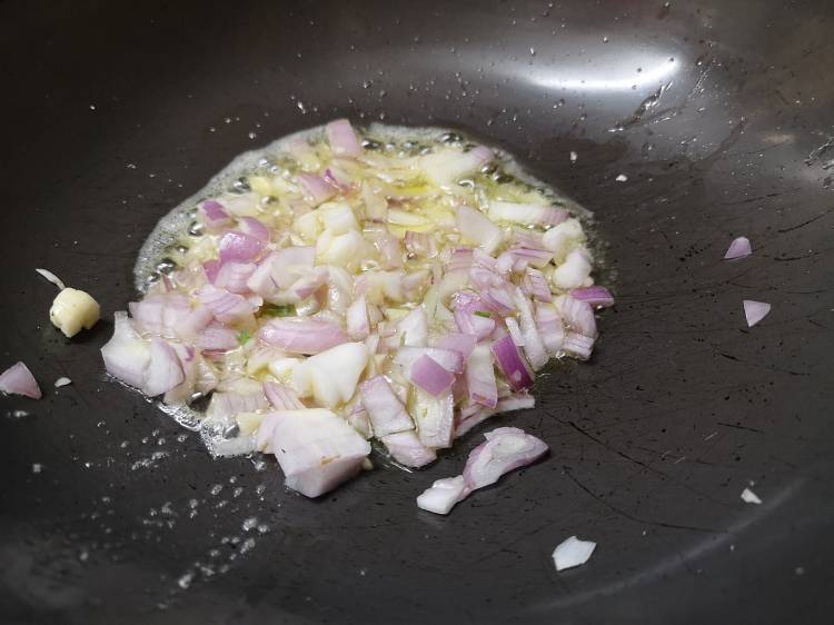 sauteing onion in butter for garlic mushroom recipe