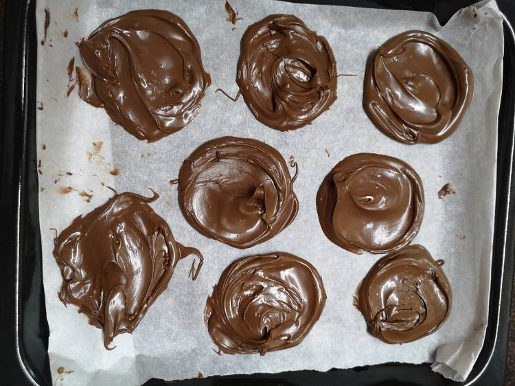 Nutella discs are ready to set in the freezer for Nutella pancakes recipe