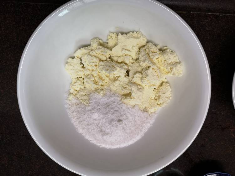 mixing cottage cheese and corn flour for Russian Cheese Recipe