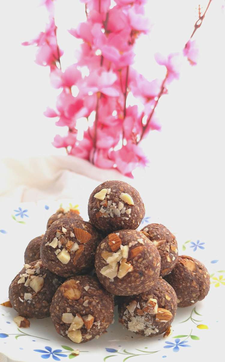 close up view of Brownie Energy Bites topped with crushed almonds ready to be served 