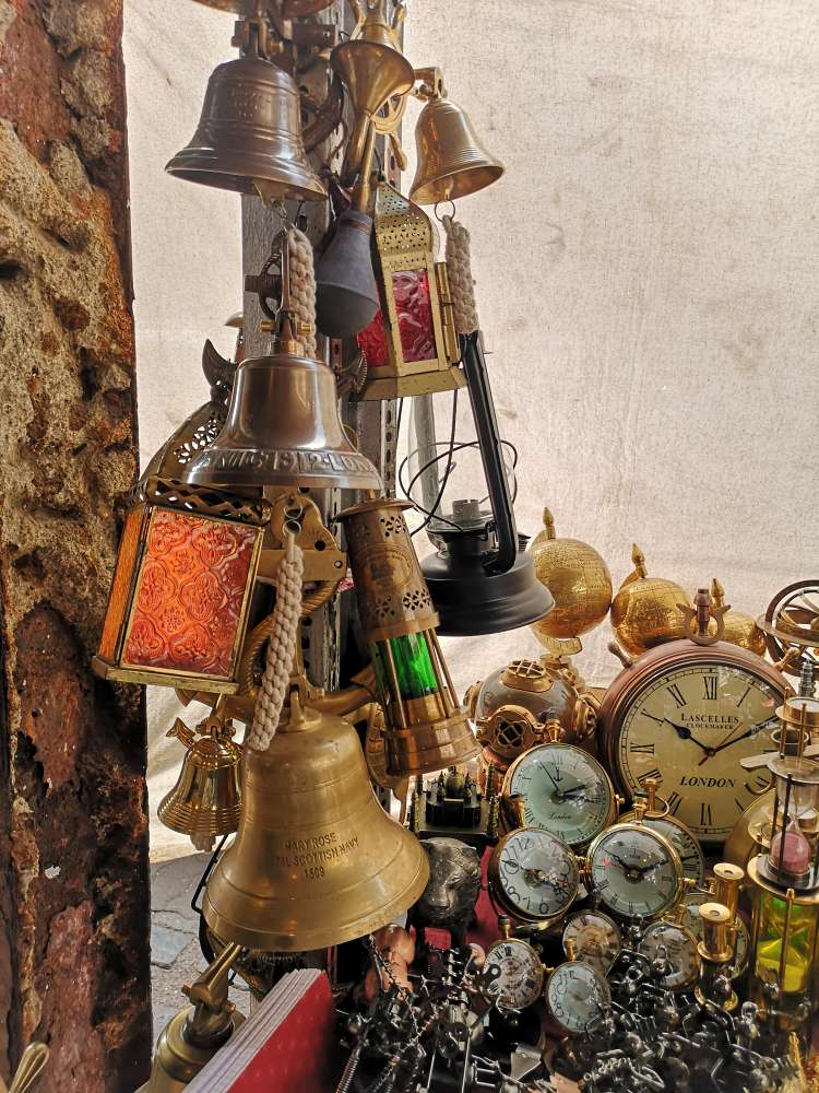 Colorful lanterns, brass Bells, antique watches, Diwali Lanterns, Brass globe on display at Colaba Causeway,blog on Colaba Causeway Shopping Tips and Tricks