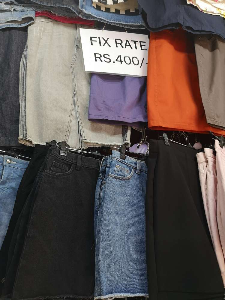 fixed rates denim and cotton skirt displayed at Colaba Causeway marlet