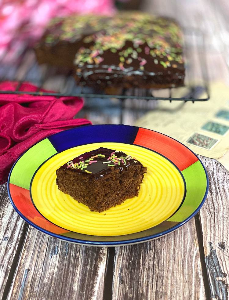 close up photo of a cut slice of chocolate Ragi Cake, ready to be eaten, how to make Chocolate Ragi Cake, Recipe of healthy Nachni Chocolate Cake
