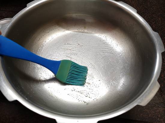 greasing pan with ghee