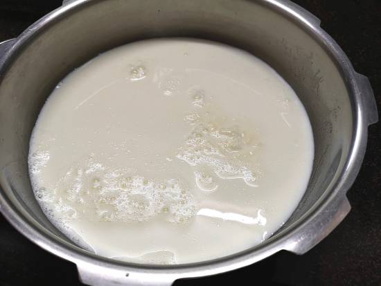 adding milk in the pan for Doodh Pak recipe