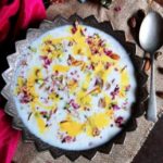 doodh pak recipe, doodh pak served in a silver bowl garnished with almonds, pistachios and kesar milk