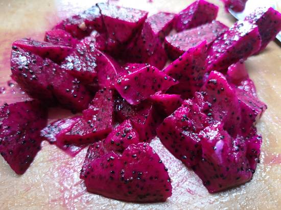 scooped our pink dragon fruit for Dragon Fruit Smoothie / recipe of dragon fruit smoothie