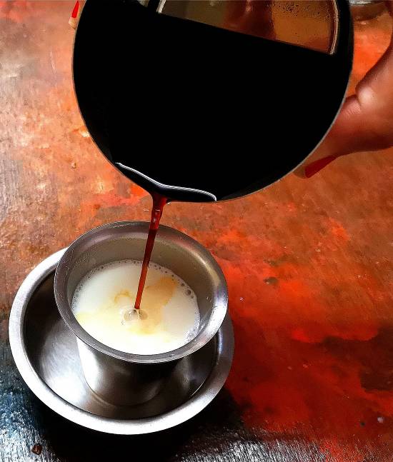 Pouring coffee decoction for Filter Coffee Recipe / Traditional South Indian Filter Coffee Recipe / filter coffee recipe | filter kaapi recipe | south indian filter coffee