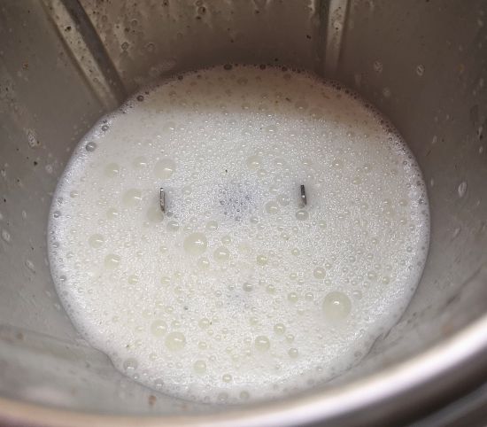 close up view of frothy masala chaas, how to make masala chaas at home, benefis of buttermilk