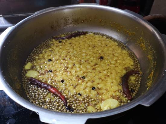 close up view of Toor Dal and spices boiled together for Mysore Rasam