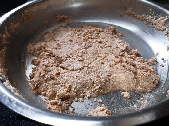 roasting amaranth flour till Ghee releases from the sides of the pan,  Rajgira Sheera Recipe 