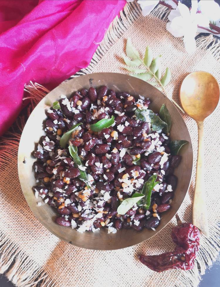 Close up view of Rajma Sundal garnished with freshly grated coconut and curry leaves
