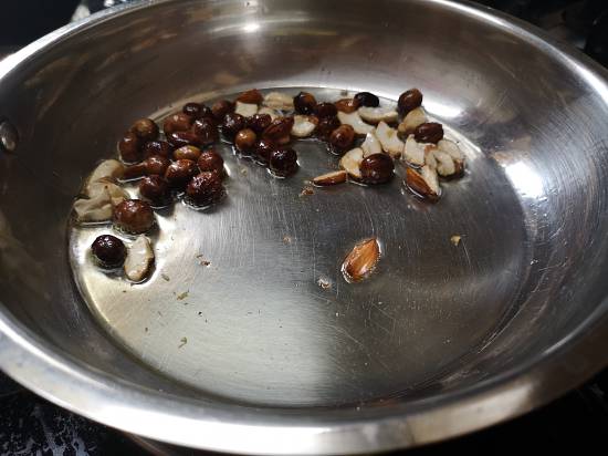 Roasting almonds, raisins in hot and melted ghee in a heavy bottomed pan for preparing semiyan payasam recipe, close up picture of Semiyan Payasam garnished with roasted cashew nuts, almonds and raisins, How to make Vermicelli Payasam