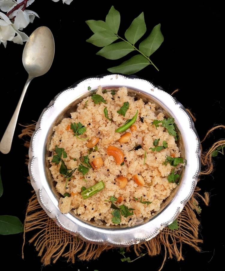 Close up view of Rava Upma garnished with finely chopped coriander leaves, cashew nuts and green chilies, How to cook Upma at home, South Indian Style Upma Recipe