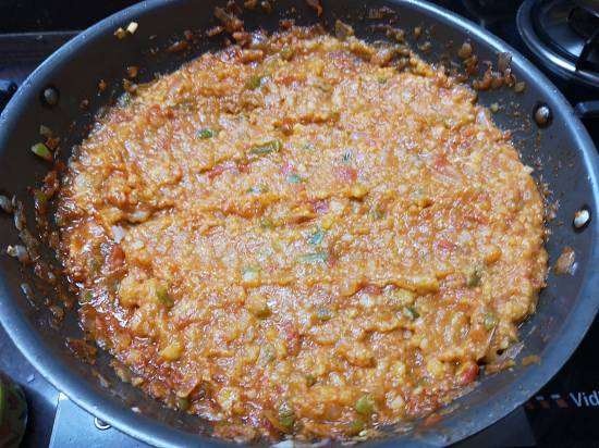 mash all the ingredients in pav bhaji recipe