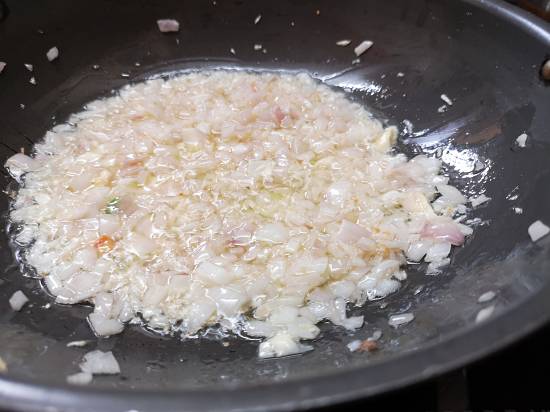 fry onions till they turn brown in pav bhaji