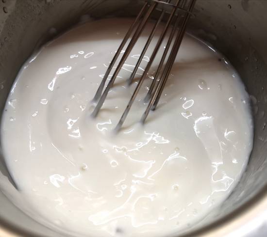 whisk the yogurt for vrat kadhi | rajgira kadhi recipe