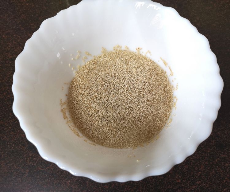 soaking poppy seeds in water in a white bowl for kesar badam doodh, saffron almond milk recipe