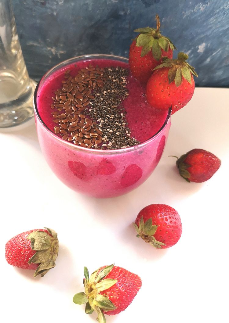 Recipe of Strawberry and Dragon Fruit Smoothie topped with chia seeds and flax seeds