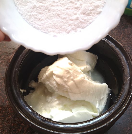 adding powdered sugar to strawberry yogurt recipe