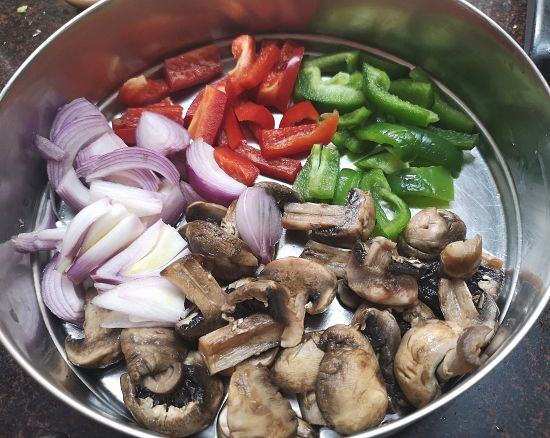 mushroom, onion, red bell pepper and green pepper cut into strips