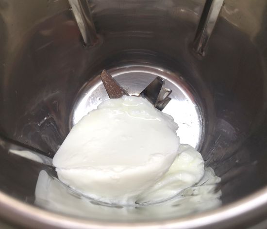 adding yogurt for Rose Lassi Recipe