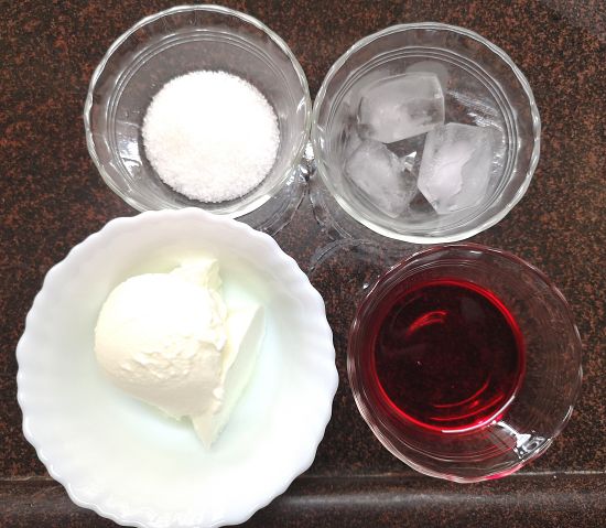 yogurt, sugar,ice and rose syrup for rose lassi recipe