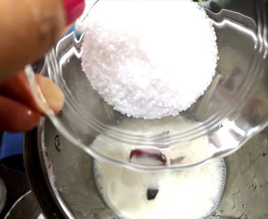 adding sugar to Rose Milkshake Recipe
