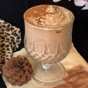 close up view of Nutella mousse served in a glass dusted with coco powder,3 Ingredients Nutella Mousse