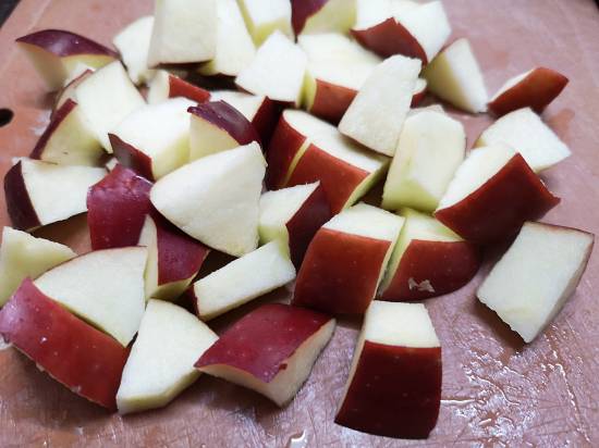 cutting apple into small chunks 