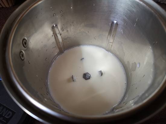 by adding cold milk to the blender for chocolate brownie smoothie