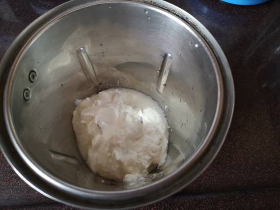 adding Yogurt into the blender for Mango Lassi