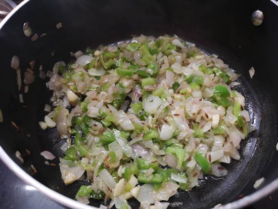 Sauteing onions, capsium for paneer bhurji recipe